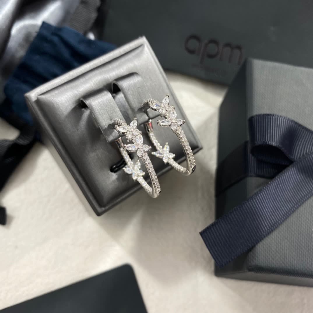 APM Monaco Silver Hoop Earrings with Butterfly Design